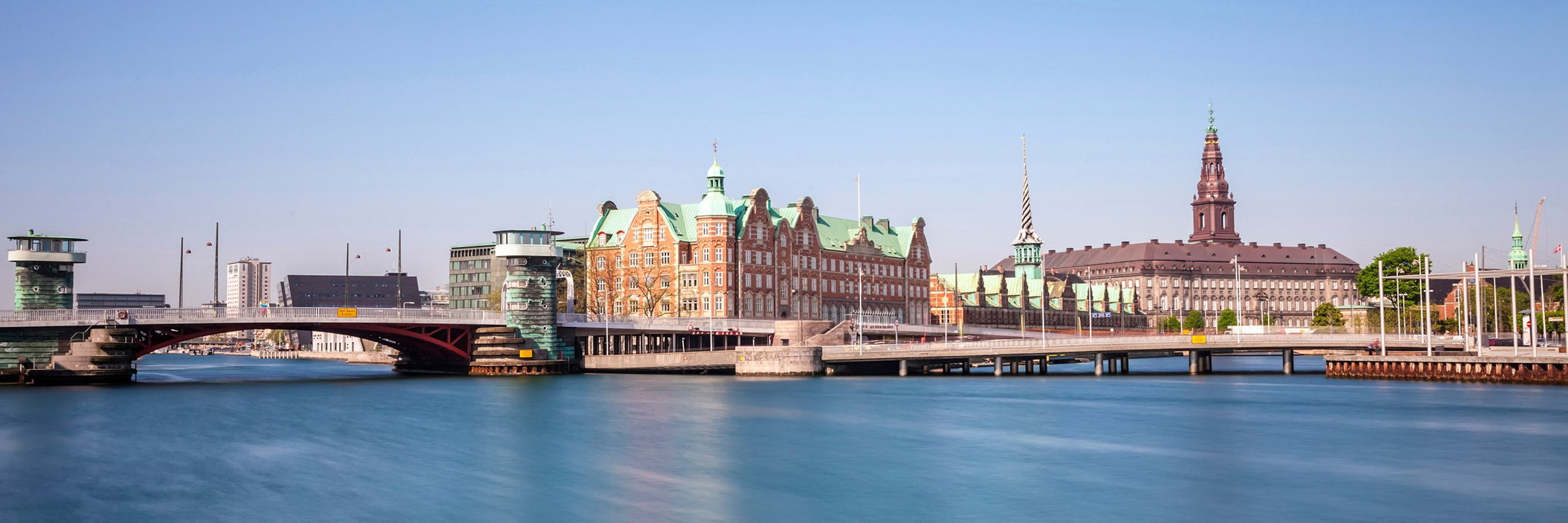 Copenhagen's Knippelsbro bridge and old Stock Exchange seen from the water
