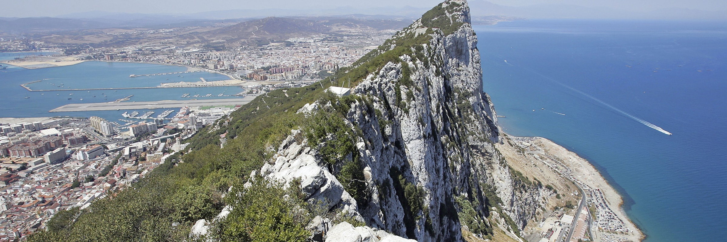 The Rock of Gibraltar rising above the bay