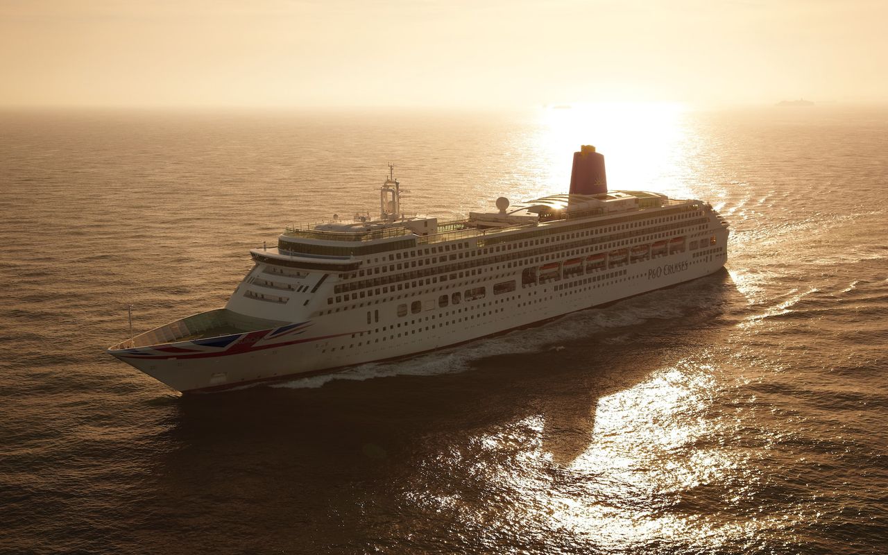 P&O Cruises Aurora at sea at sunset