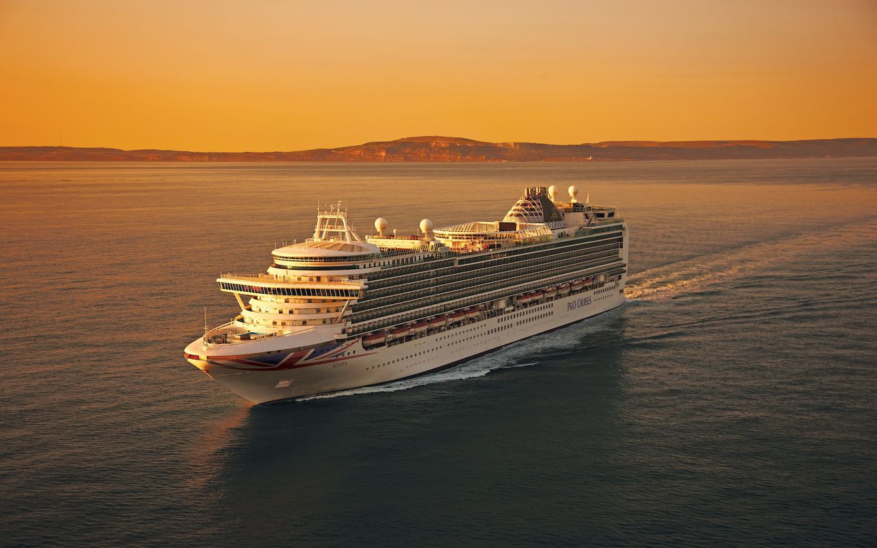 P&O Cruises Azura at sea at sunset